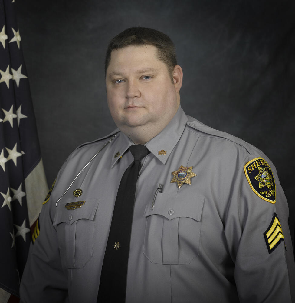 Brian Patterson wearing grey Sheriff's Office uniform
