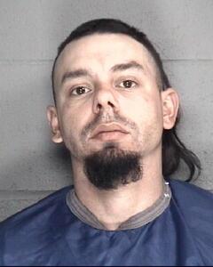 Mugshot of QUILESCINTRON, JOSE RAUL