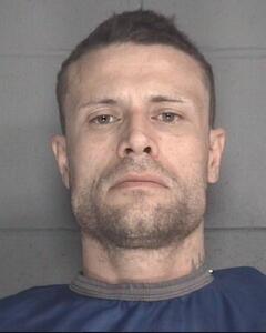 Mugshot of BUZA, JOSHUA D
