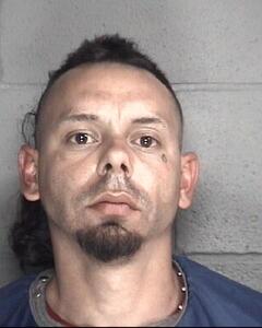 Mugshot of QUILESCINTRON, JOSE RAUL