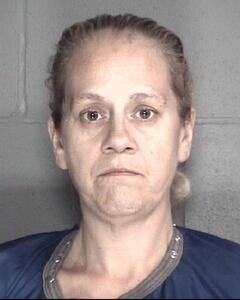 Mugshot of REUSS, PANOLA LEE